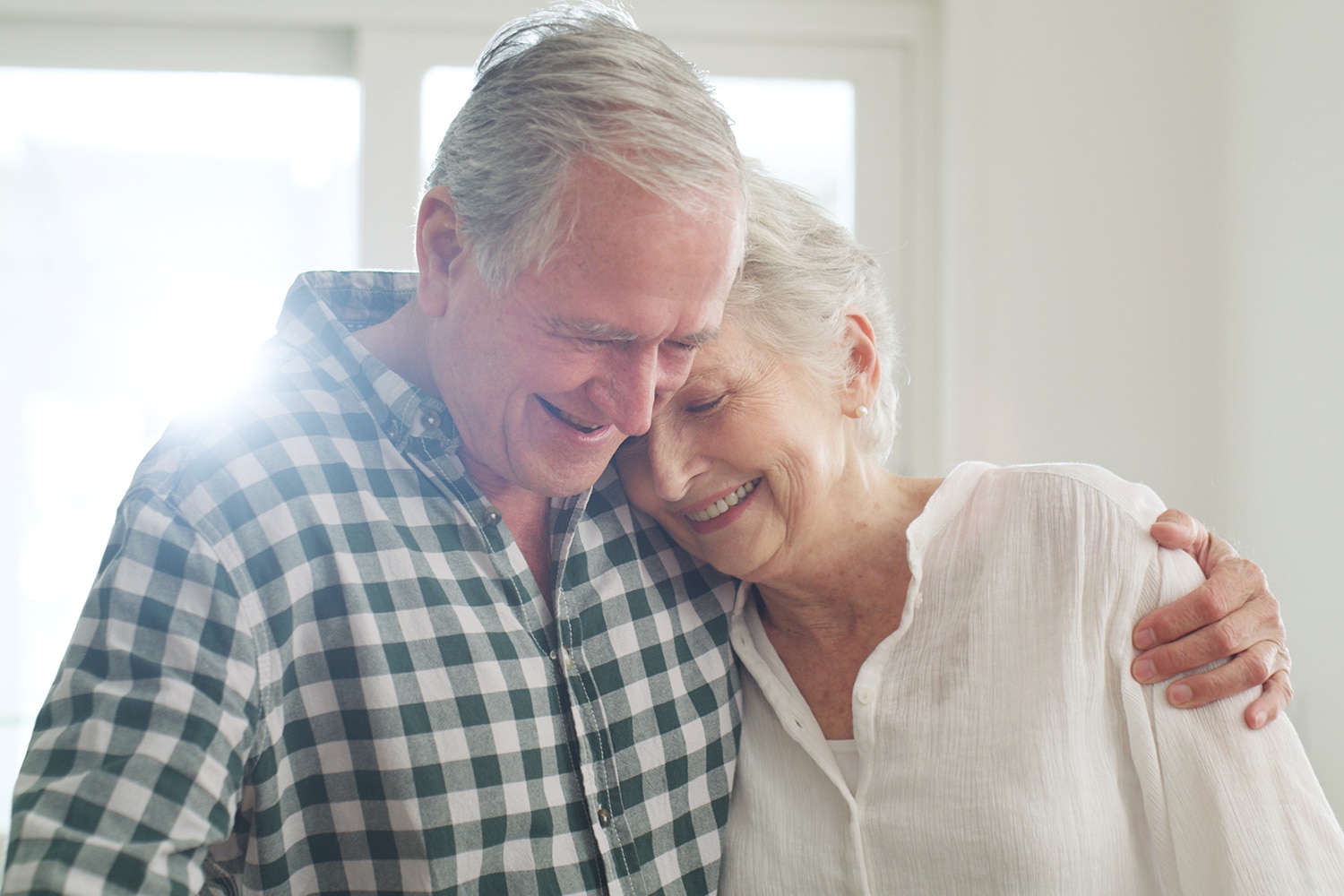 Senior man embracing his wife