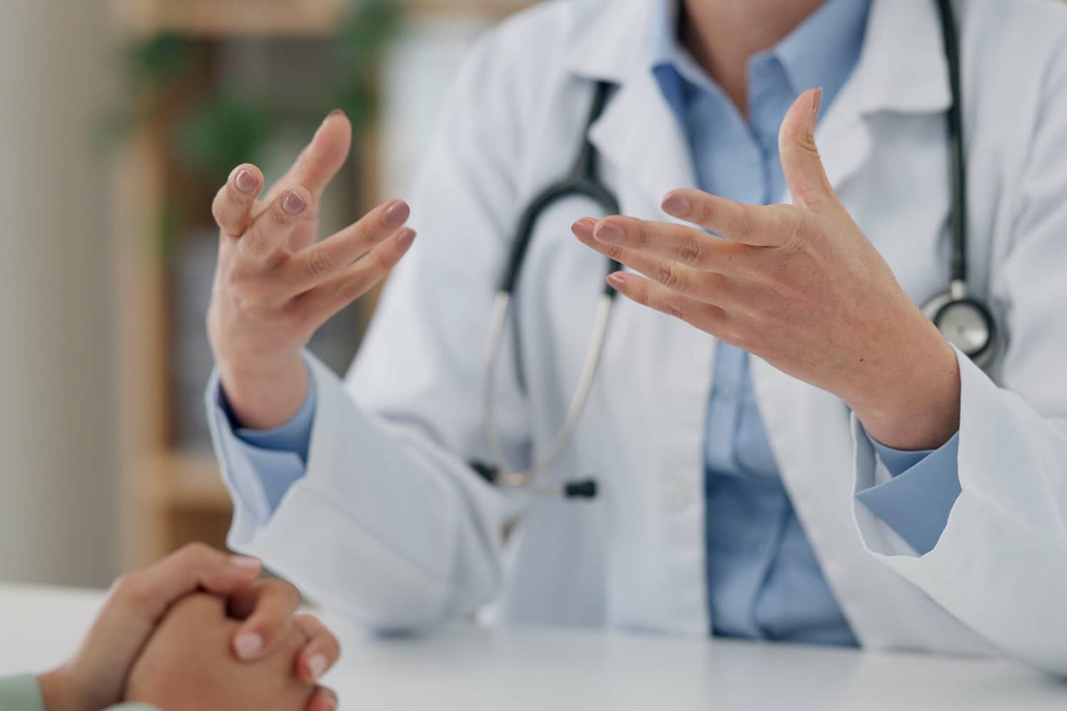 Close up doctor patient consultation